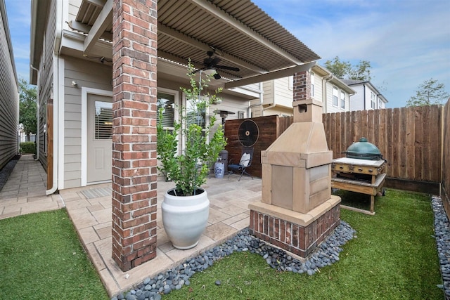 view of patio / terrace featuring ceiling fan and grilling area