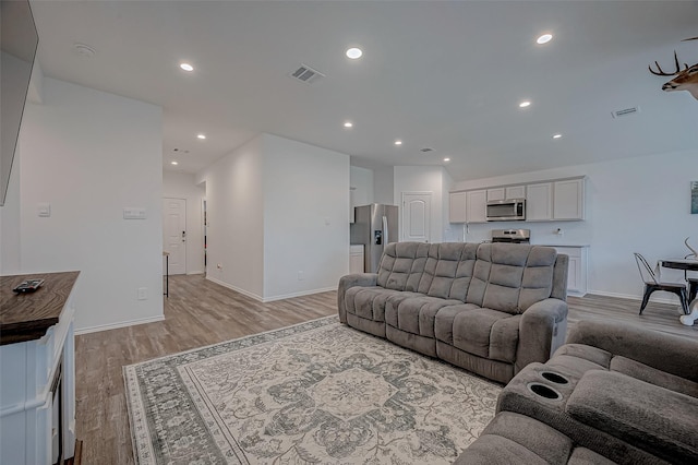 living room featuring light wood-type flooring