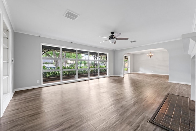 unfurnished living room featuring hardwood / wood-style flooring, crown molding, ceiling fan with notable chandelier, and built in features