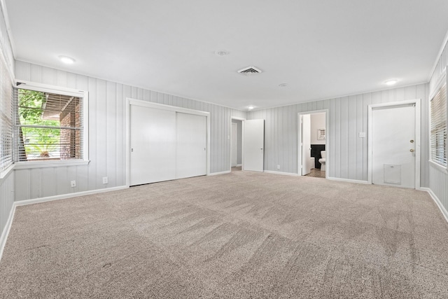 unfurnished bedroom featuring carpet floors