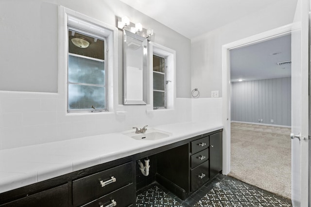 bathroom featuring vanity