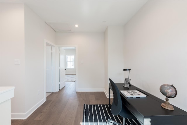 home office with wood-type flooring