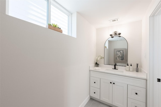 bathroom featuring vanity and tile patterned flooring