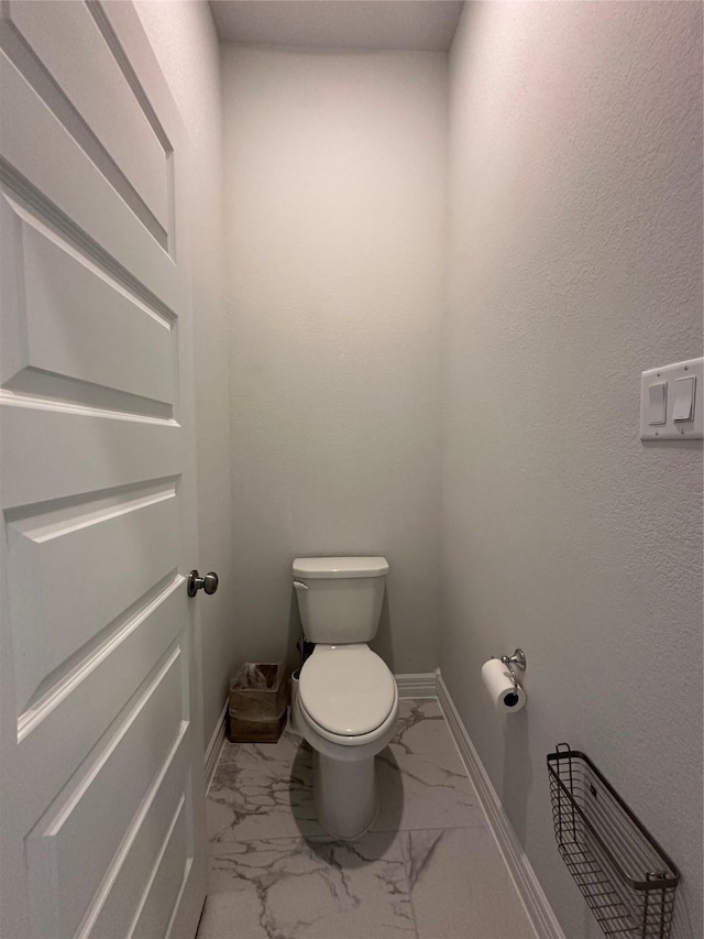 bathroom featuring toilet