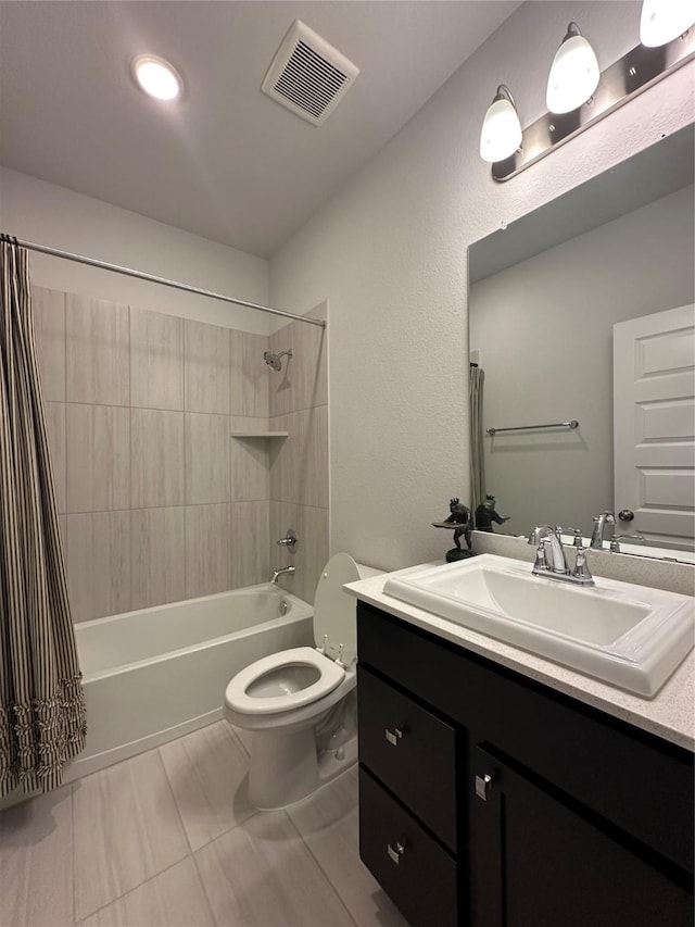 full bathroom with vanity, toilet, and shower / bath combo with shower curtain