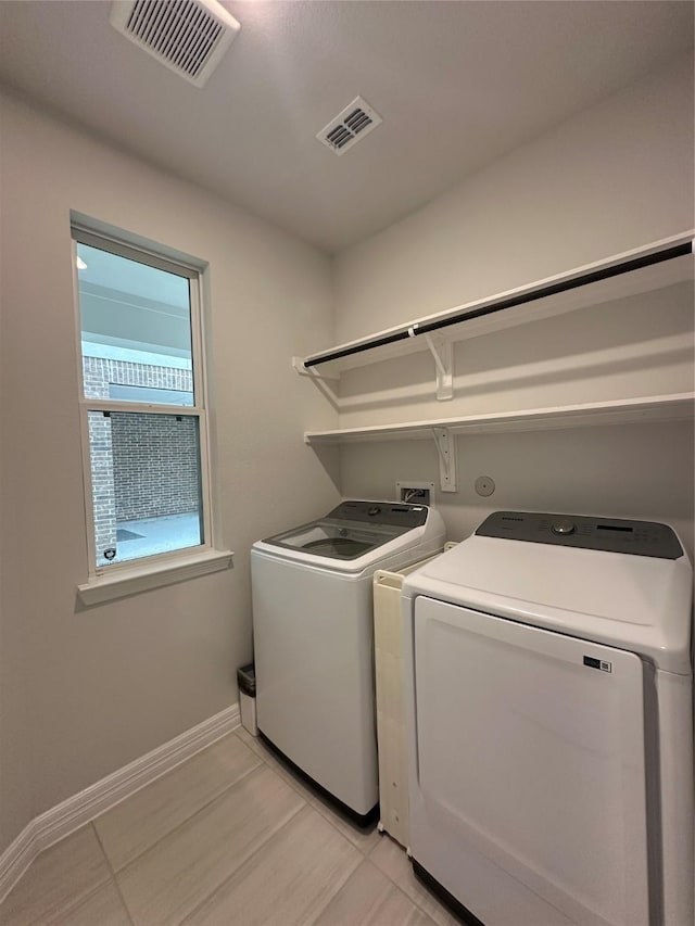 laundry area featuring washer and clothes dryer