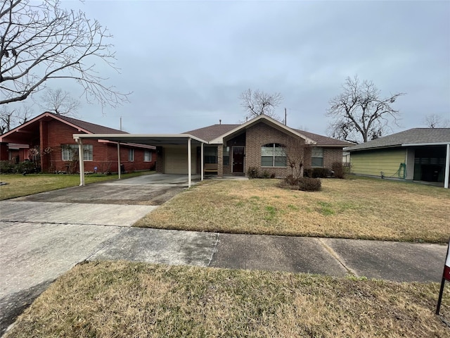 single story home featuring a carport and a front yard