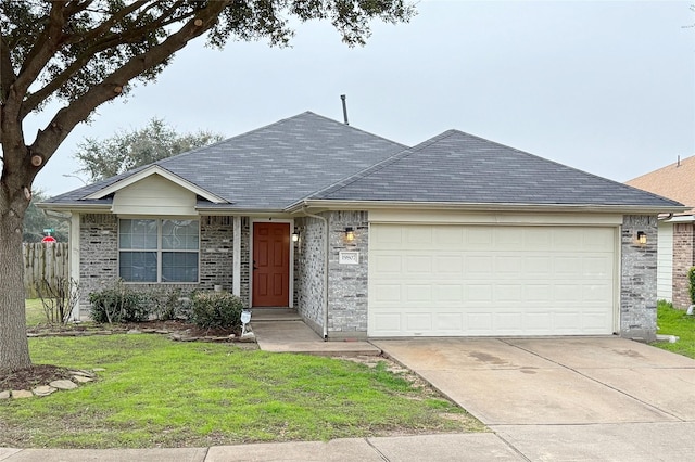 single story home featuring a garage and a front lawn