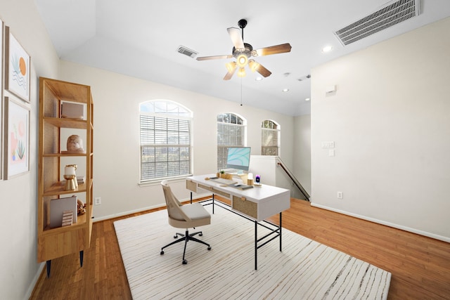 home office featuring ceiling fan and light wood-type flooring