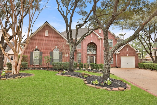 view of front property featuring a garage and a front yard