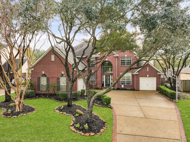 front of property with a garage and a front lawn