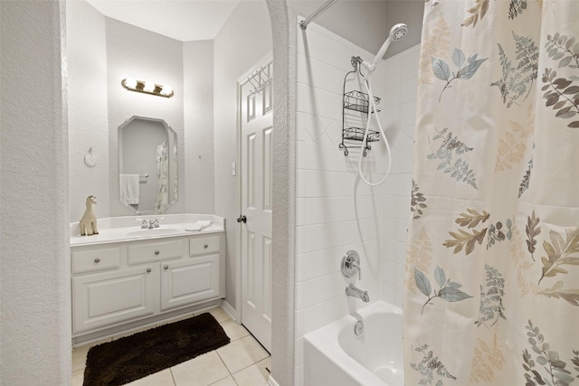 bathroom with shower / tub combo, vanity, and tile patterned floors