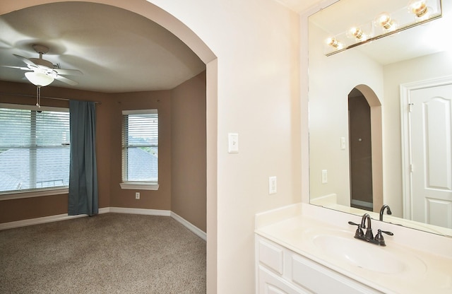 bathroom featuring vanity and ceiling fan