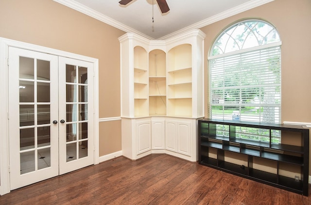 empty room with ornamental molding, ceiling fan, dark hardwood / wood-style flooring, and french doors