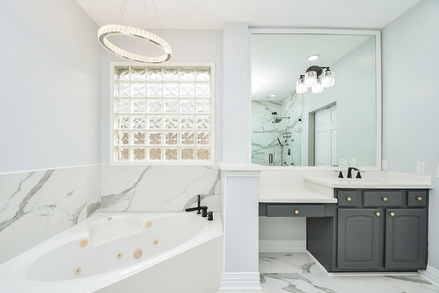 bathroom featuring independent shower and bath and vanity