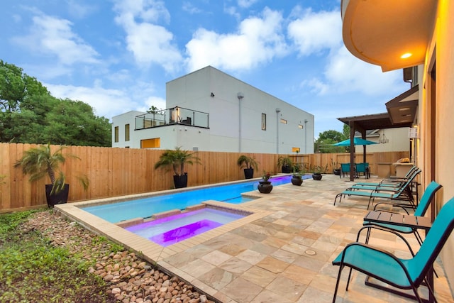 view of sport court featuring a fenced in pool