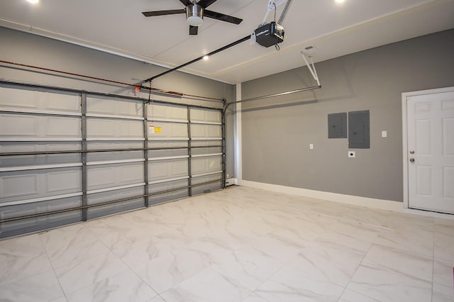 garage with a garage door opener, electric panel, and ceiling fan