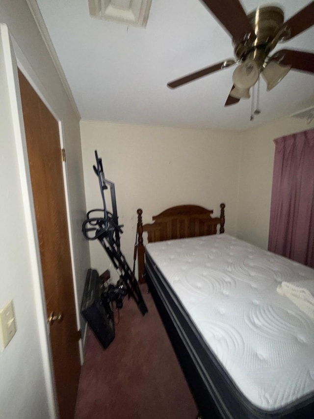 bedroom with ceiling fan and carpet