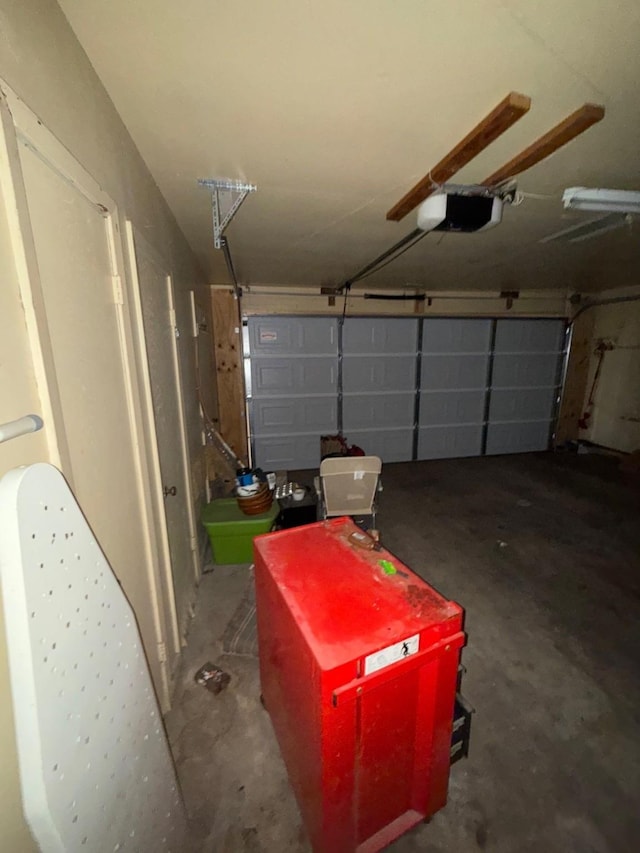 garage featuring a garage door opener