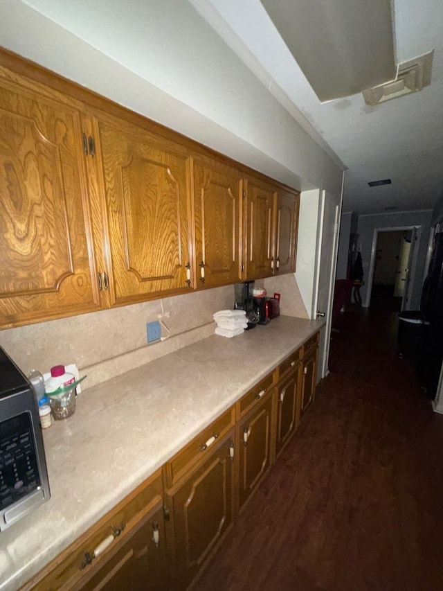 kitchen featuring dark wood-type flooring