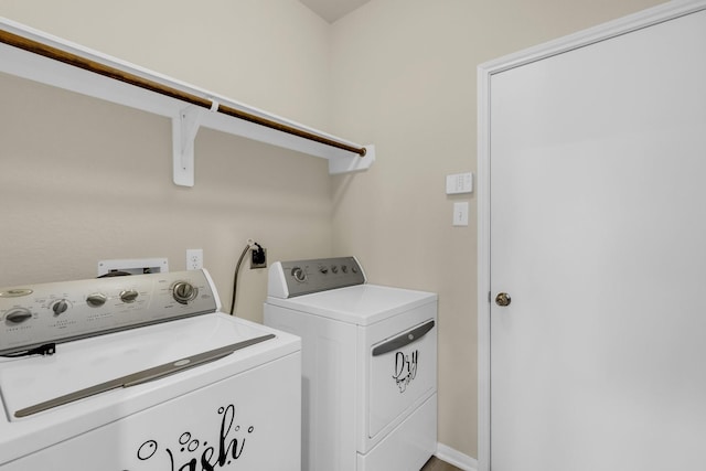 laundry area with washing machine and dryer