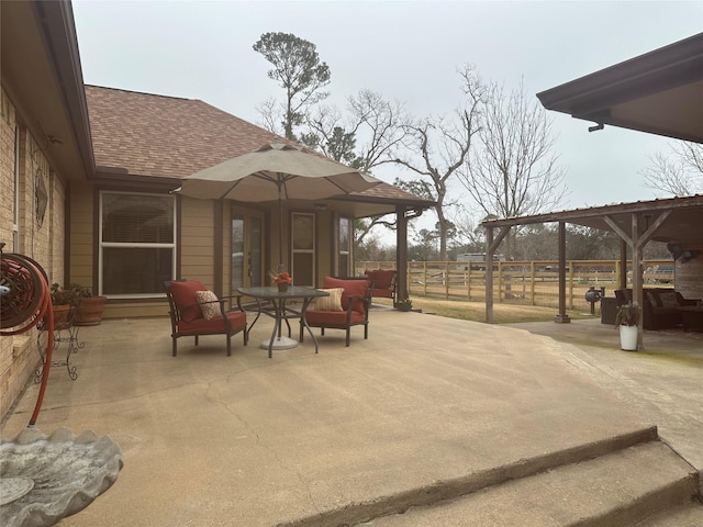 view of patio with fence