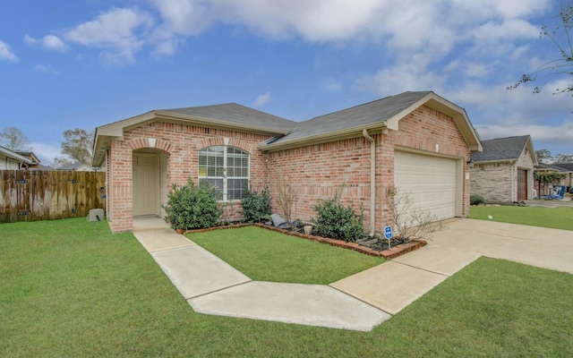 ranch-style house featuring a garage and a front lawn