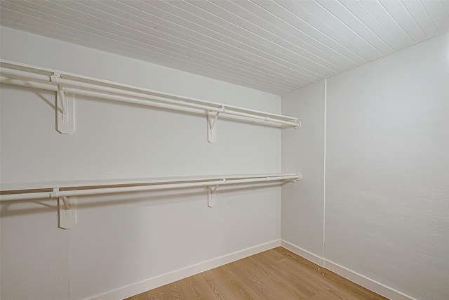 walk in closet featuring light hardwood / wood-style floors