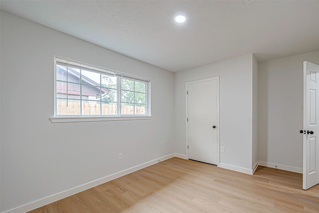 unfurnished bedroom featuring light hardwood / wood-style flooring