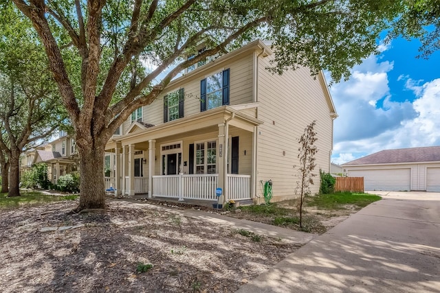 view of front facade with a garage and covered porch