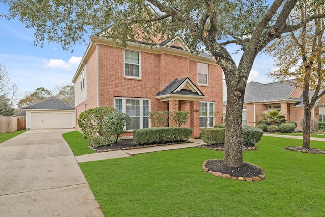 view of front of property featuring a garage and a front lawn