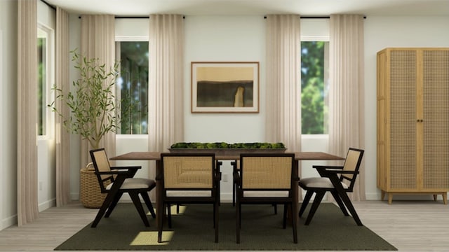 dining space with breakfast area and light wood-type flooring