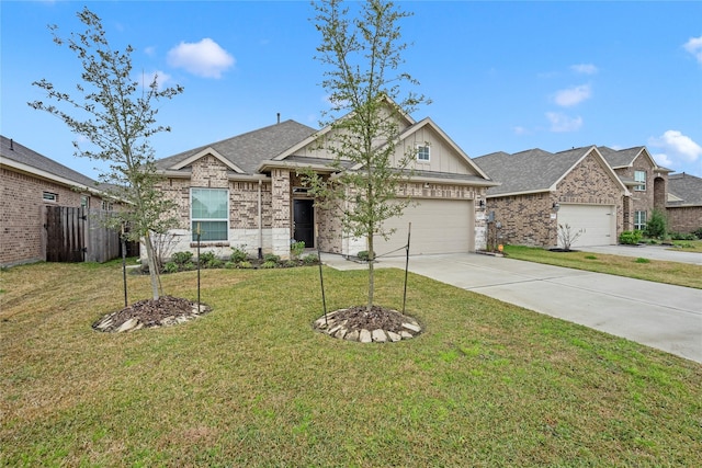 view of front of home with a garage and a front yard