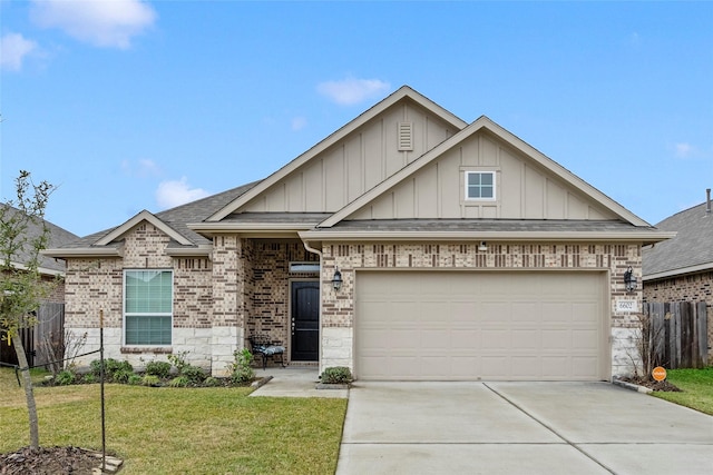 view of front of home featuring a garage and a front lawn