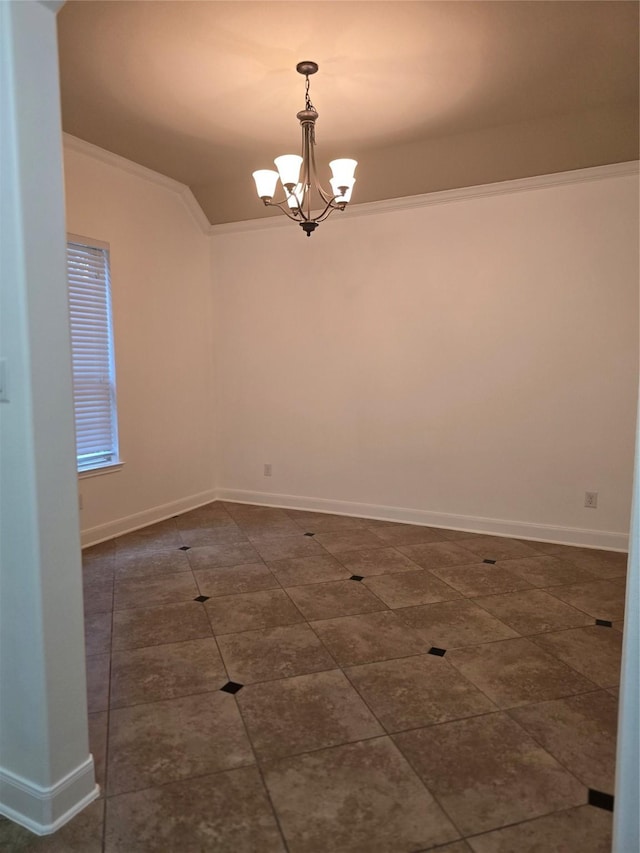 unfurnished room with a notable chandelier and ornamental molding