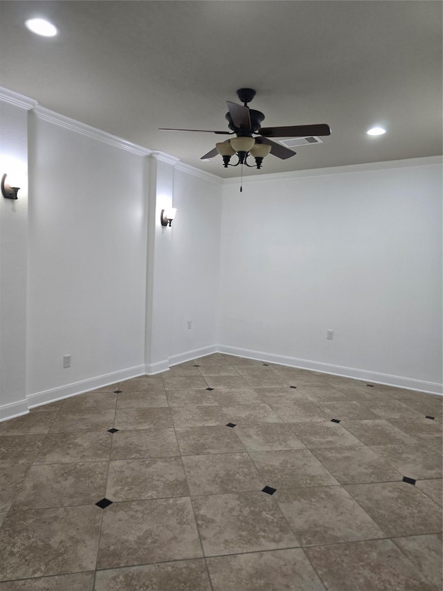 spare room featuring tile patterned flooring, ornamental molding, and ceiling fan