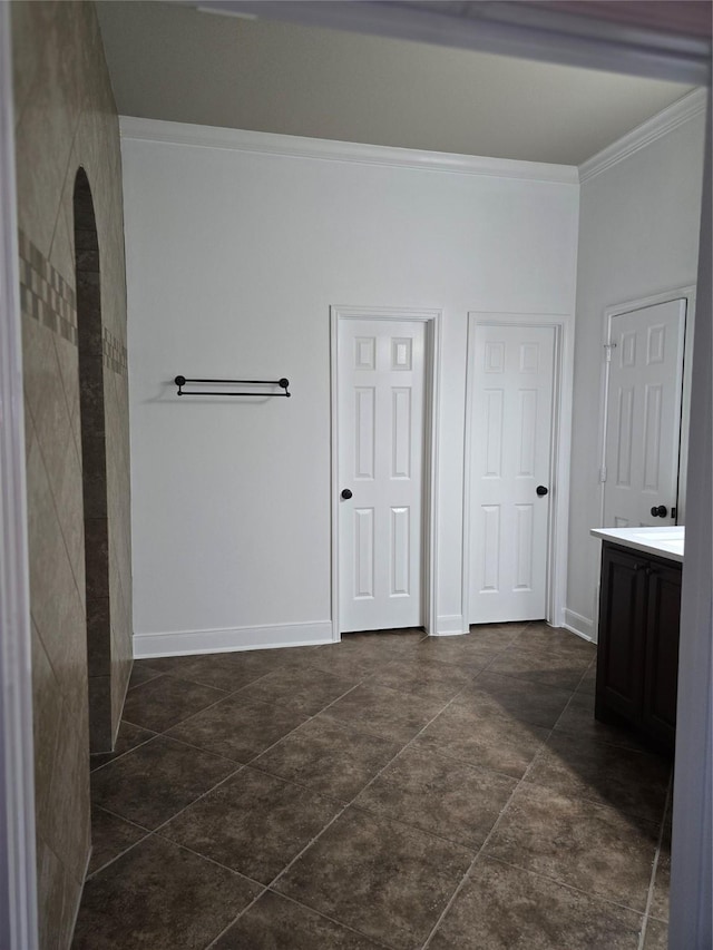 bathroom featuring vanity and crown molding