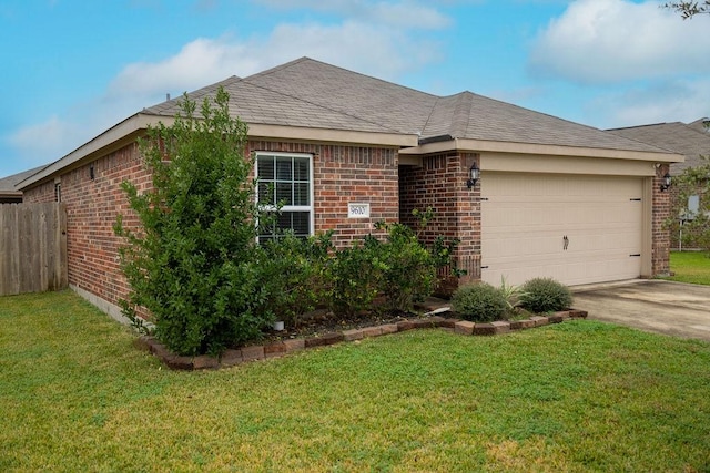 ranch-style house featuring a garage and a front lawn