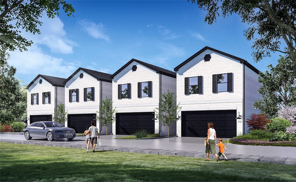 view of front facade featuring a garage and a front yard