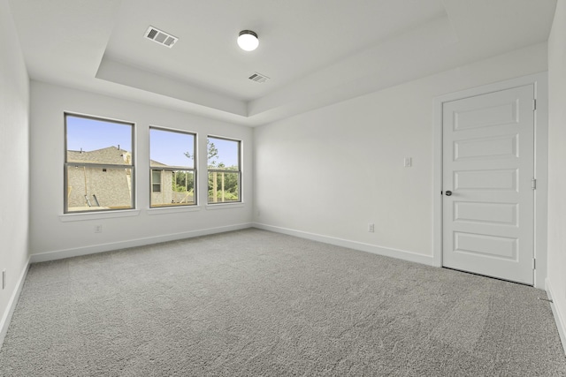 16651 Yaklin Meadow Ct, Humble, TX 77346 - carpeted empty room featuring baseboards and a tray ceiling