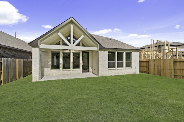 16651 Yaklin Meadow Ct, Humble, TX 77346 - back of house featuring brick siding and a patio area