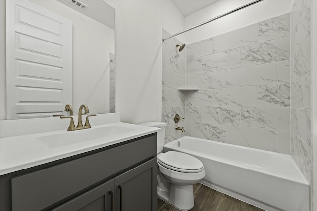 16651 Yaklin Meadow Ct, Humble, TX 77346 - bathroom with vanity, shower / bathtub combination, and wood finished floors