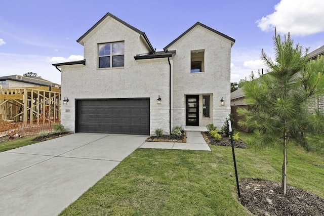 16651 Yaklin Meadow Ct, Humble, TX 77346 - view of front of house featuring a garage and driveway
