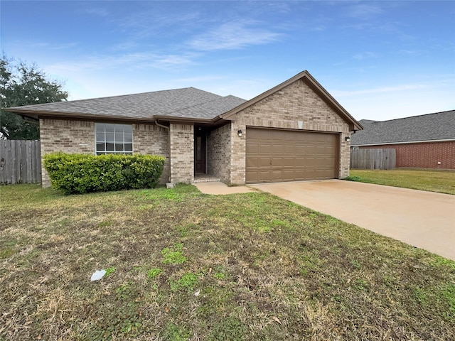 single story home with a garage and a front lawn