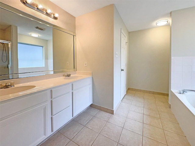 bathroom with vanity, independent shower and bath, and tile patterned flooring