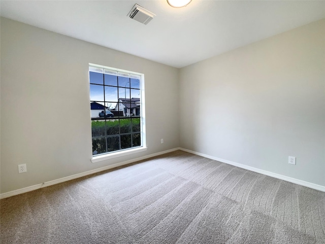 view of carpeted spare room