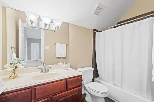 full bathroom featuring vanity, shower / tub combo, a textured ceiling, and toilet