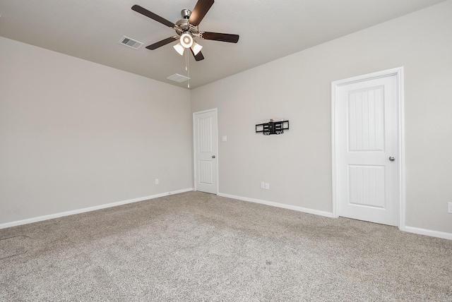 empty room with carpet and ceiling fan