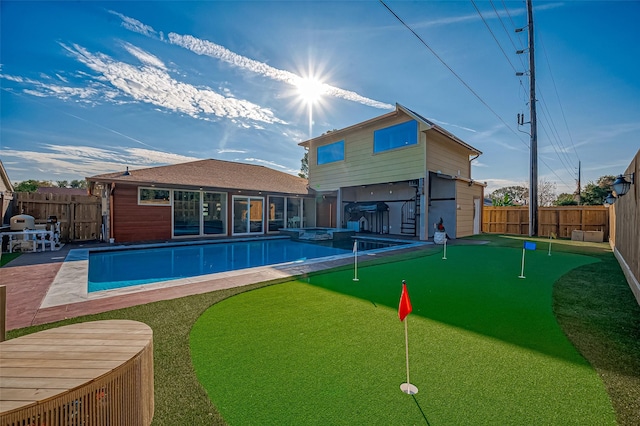 view of pool featuring a hot tub and a patio area