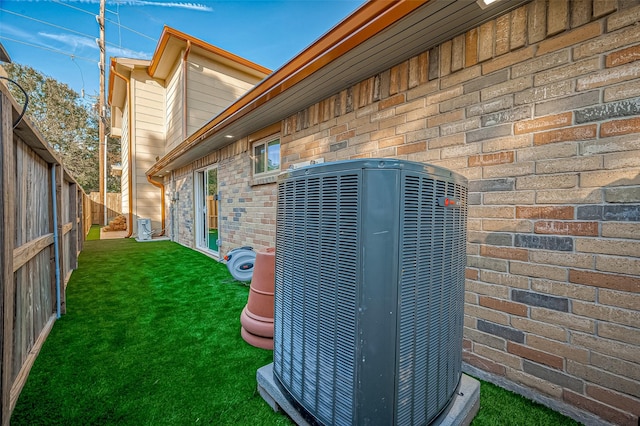 exterior details featuring central AC unit